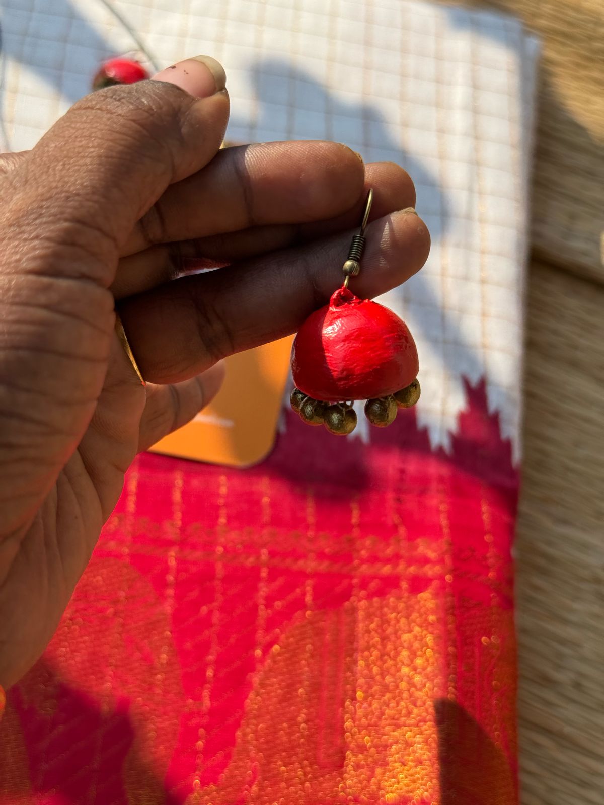 Sungudi cotton paired with chilanga and teracotta jewels