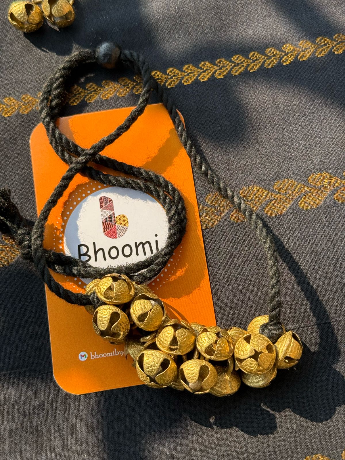 Sungudi cotton saree paired with chilanga jewels .