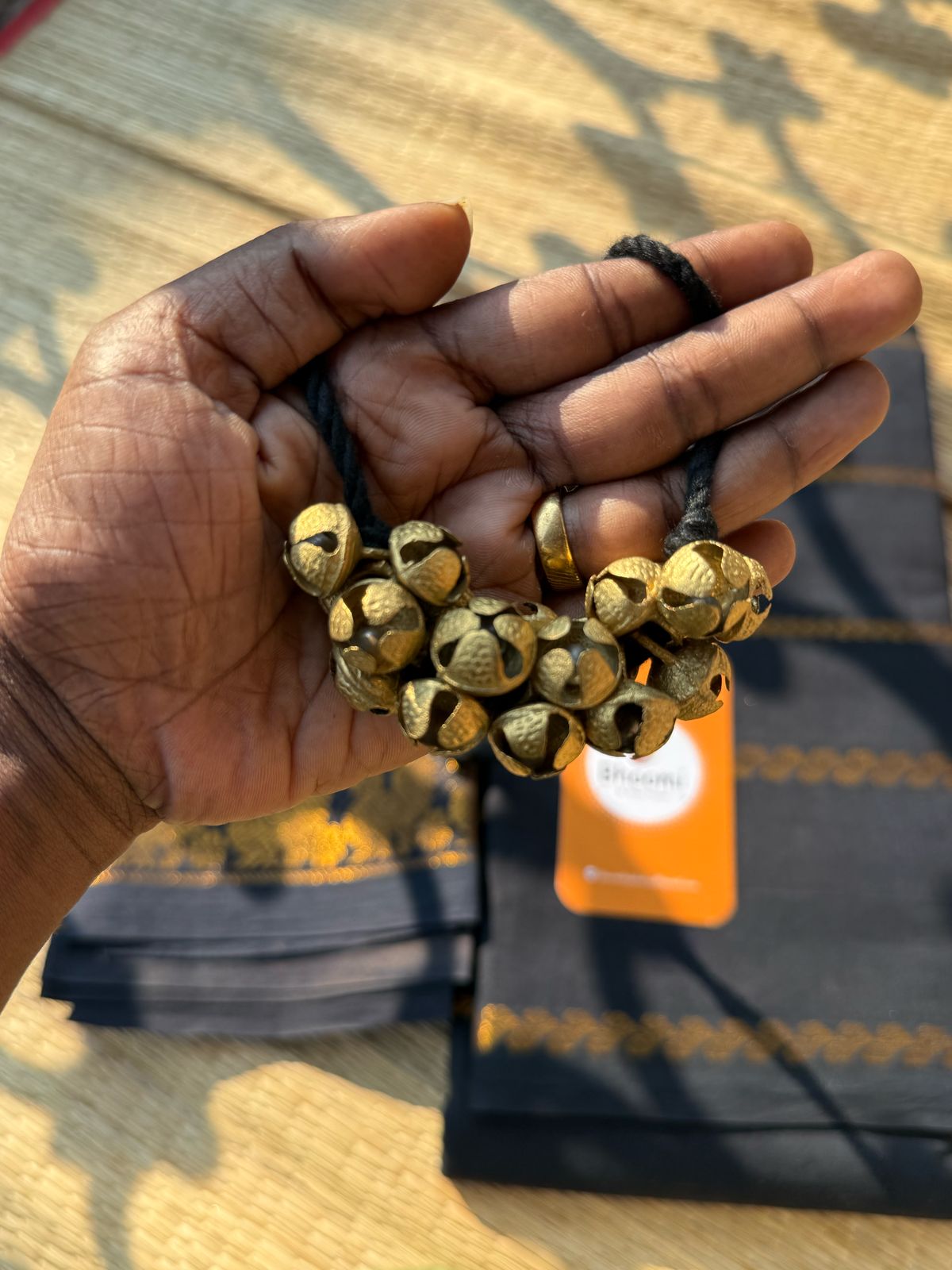 Sungudi cotton saree paired with chilanga jewels .